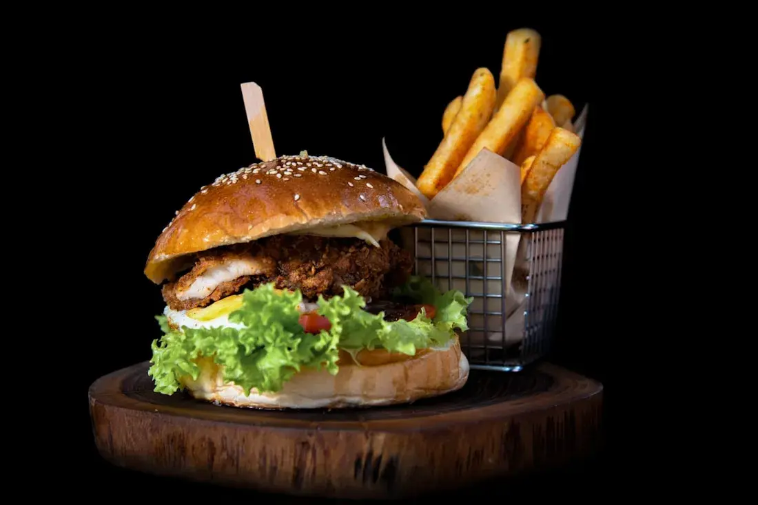 Burger and fries served at a restaurant — stock photo placeholder