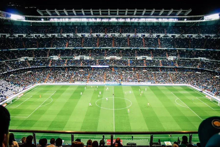 Fans filling a soccer stadium — stock photo placeholder